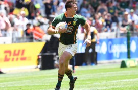 File: South Africa's Impi Visser runs the ball during a HSBC World Rugby Sevens Series match. AFP/Rodger Bosch