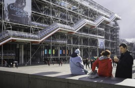 File: Tourists in front of the iconic Pompidou Centre museum in Paris. Eric Broncard/Hans Lucas via AFP
