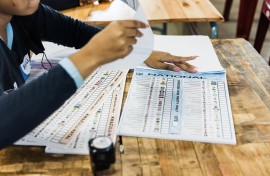 official prepares ballot papers