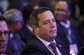 DA leader John Steenhuisen looks on while waiting for the beginning of the official announcement of the South African general election results. AFP/Phill Magakoe