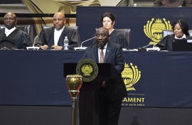 President Cyril Ramaphosa addresses Members of Parliament. AFP/Rodger Bosch