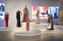 Dresses are displayed during a press preview for the "Naomi" exhibition. AFP/Justin Tallis
