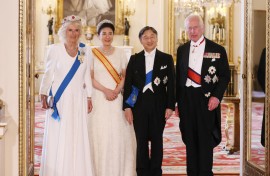 Britain's King Charles III, Japanese Emperor Naruhito, Empress Masako, and Britain's Queen Camilla pose for cameras before the banquet. AFP/Pool
