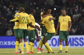 Bafana Bafana players celebrate their victory over Zimbabwe. BackpagePix/Sydney Mahlangu