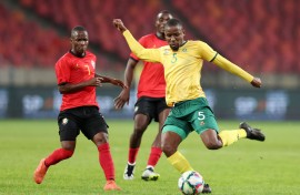 Malebogo Modise challenged by Chamito Loborino Alfandega. BackpagePix/Muzi Ntombela