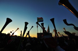South African fans celebrate in Johannesburg.