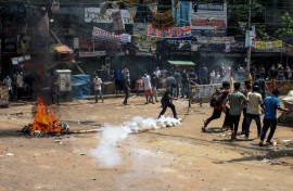 Anti-quota protesters clash with the police in Dhaka. AFP