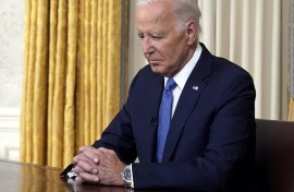 US President Joe Biden pauses before addressing the nation about his decision to not seek reelection. AFP/Pool