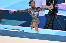 Simone Biles performs during floor exercise of artistic gymnastics women’s qualification. Kaname Muto/The Yomiuri Shimbun via AFP