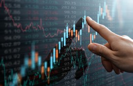 File: Candlestick chart and data of financial market. GettyImages/tadamichi