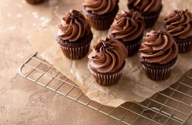 File: Dark chocolate cupcakes with chocolate ganache frosting. GettyImages/VeselovaElena