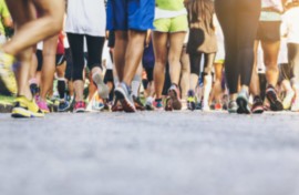 File: A crowd of people walking and running. GettyImages/VTT Studio