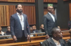 Zizi Kodwa and Jehan Mackay appear at the Palm Ridge Magistrate's Court.