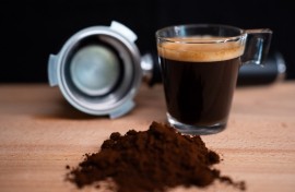 File: A glass of espresso coffee, a portafilter, and some coffee blend. Nikos Pekiaridis/NurPhoto via AFP