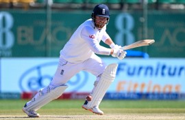 File: England's Jonny Bairstow watches the ball after playing a shot. AFP/Sajjad Hussain