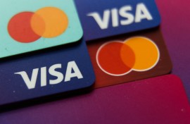 File: MasterCard and Visa credit cards. Jakub Porzyck/NurPhoto via AFP
