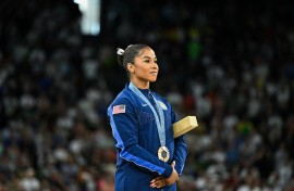 Jordan Chiles poses during the podium ceremony for the artistic gymnastics women's floor exercise event. AFP/Gabriel Bouys