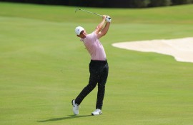 Rory McIlroy of Northern Ireland plays a shot. Kevin C. Cox/Getty Images via AFP
