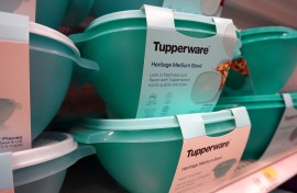 File: Tupperware products are offered for sale at a retail store. AFP/Scott Olson/Getty Images