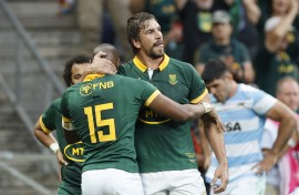 Aphelele Fassi celebrates after scoring the team's third try with Eben Etzebeth. AFP/Phill Magakoe