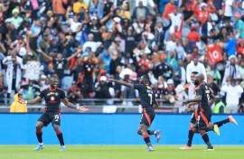Deon Hotto of Orlando Pirates celebrates a goal with his teammates. BackpagePix/Samuel Shivambu