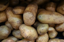 Potatoes seen at a grocery store. AFP