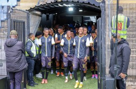 The Royal AM team walking onto the pitch. BackpagePix/Pierre Tostee