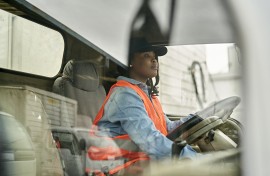 File: A female truck driver. GettyImages/xavierarnau