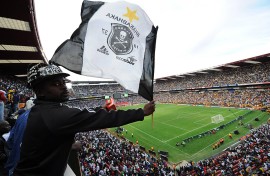 File: A fan waving an Orlando Pirates flag. Lefty Shivambu/Gallo Images/Getty Images