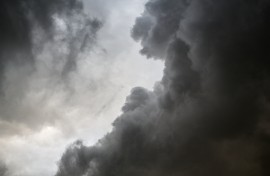 File: Dark grey storm clouds during a rain storm. Romain Costaseca/Hans Lucas via AFP
