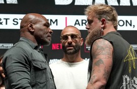 US boxer Mike Tyson (L) and US boxer-actor Jake Paul (R) face each other during a press conference ahead of their heavyweight bout at The Pavilion at Toyota Music Factory in Irving, Texas on November 13, 2024.