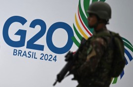 File: A soldiers patrols the surroundings of the Museum of Modern Art ahead of the G20 Leaders Summit in Rio de Janeiro, Brazil on November 15, 2024. The G20 Leaders' Summit will take place in Rio de Janeiro between November 18 and 19, 2024.