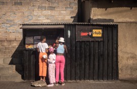 Girls shop at a tuck shop in Alexandra. Chris McGrath/Getty Images