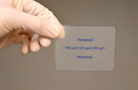 File: A patch containing the active ingredient Fentanyl is shown by a pharmacist. 