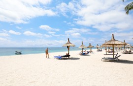 A general view of tourists of the Flic en Flac beach at Hotel Villa Carolina, located on the western coast of Mauritius. AFP/Laura Morosoli