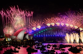 File: Fireworks are lighting up the sky over the Sydney Harbour Bridge and the Sydney Opera House during New Year's Eve celebrations. Izhar Khan/NurPhoto via AFP