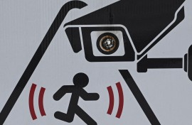 File: A CCTV in operation sign. Artur Widak/NurPhoto via AFP