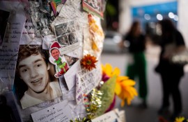 Tributes to British singer Liam Payne are pictured in front of the "Casa Sur Palermo" hotel, where he died. AFP/Tomas Cuesta