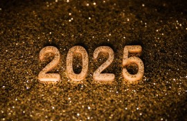 Happy New Year 2025 wooden numbers are photographed. Beata Zawrzel/NurPhoto via AFP