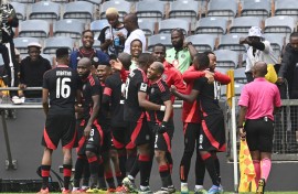 Deano van Rooyen of Orlando Pirates celebrates a goal with his teammates. BackpagePix/Sydney Mahlangu