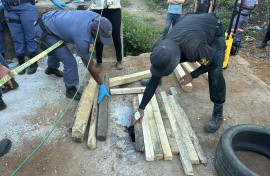 Police officers at an abandoned mine in Sabie. eNCA/Pule Letshwiti-Jones