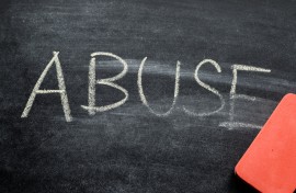 File: The word abuse written on a black board. GettyImages/sebastianosecondi
