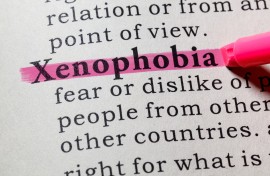 File: The word xenophobia, including key descriptive words. GettyImages/Devonyu