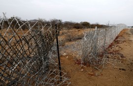 File: A vandalised border fence that separates South Africa and Zimbabwe where near the Beitbridge border post. AFP/Phill Magakoe
