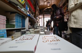 People browse publications at a bookshop in Damascus. AFP/Louai Beshara