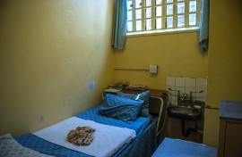 A prison cell. AFP/Mujahid Safodien