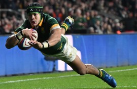 South Africa's wing Cheslin Kolbe scores a try. AFP/Justin Tallis