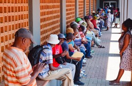 Shop owners queue to register their spaza shop businesses. Gallo Images/Fani Mahuntsi