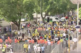 Soccer fans enter the Loftus Versveld grounds