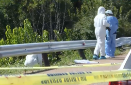 Investigators scouring the scene at Hennops River.